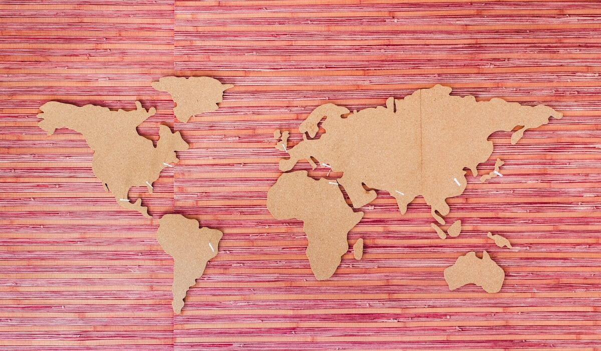 Judge’s gavel atop glowing circuit-board world map symbolizing global AI ad-tech compliance crisis