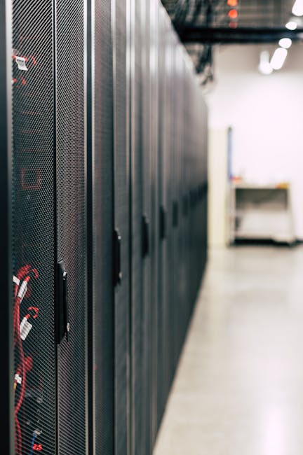 Female executive at illuminated server racks symbolizing independent agency building proprietary measurement infrastructure to break free from Big Tech control