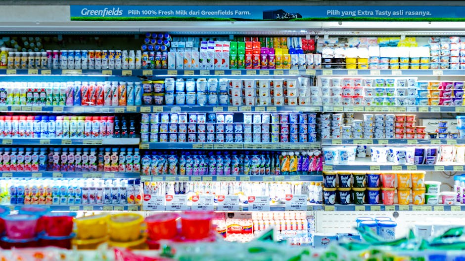 AI whispers budget-saving audio ad strategy to Nutpods non-dairy creamer on Kroger shelf, symbolizing smart CPG marketing