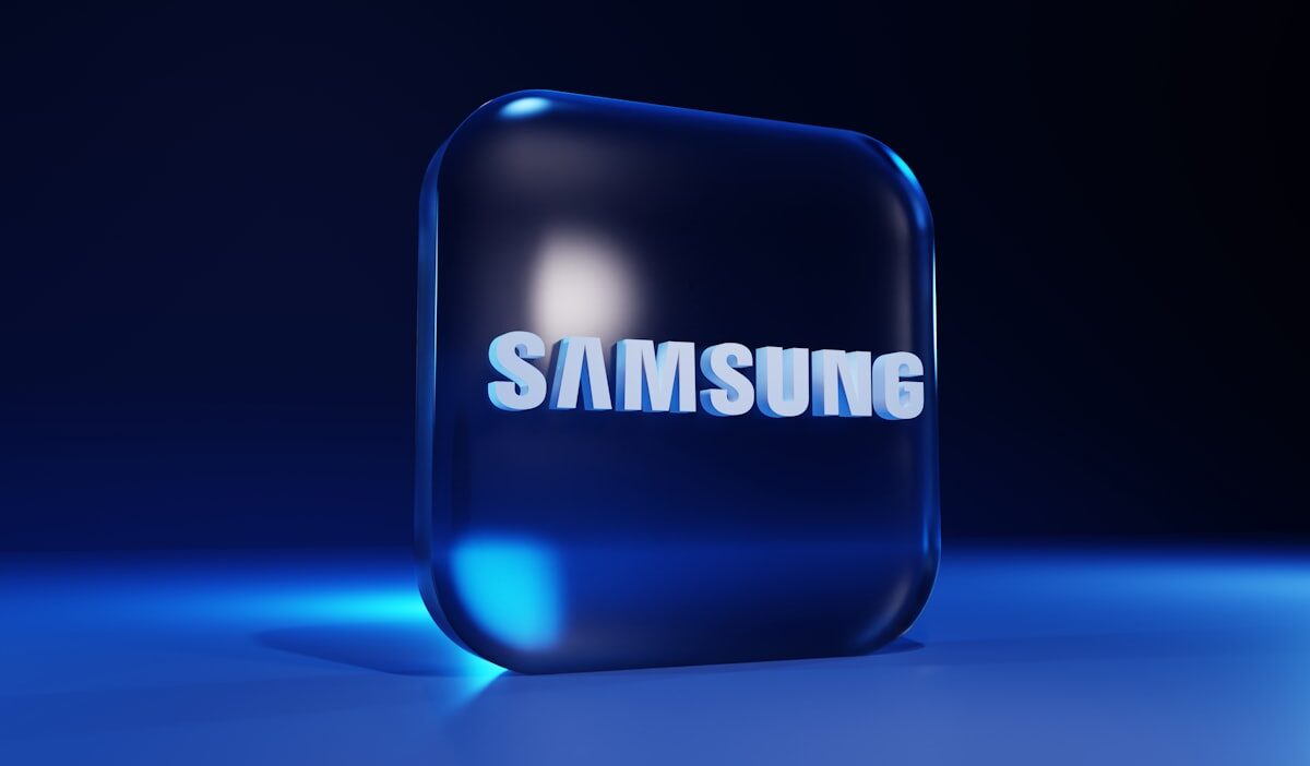 Samsung smart TV displaying Crumbl cookie ad while mobile app install confirmation appears on screen, illustrating CTV-to-app performance funnel